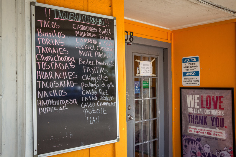 Closed sign on the front door of Taqueria Gerrero in New Orleans, LA.