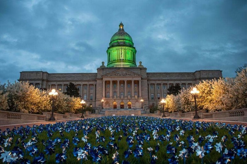 Picture of a building glowing green. 