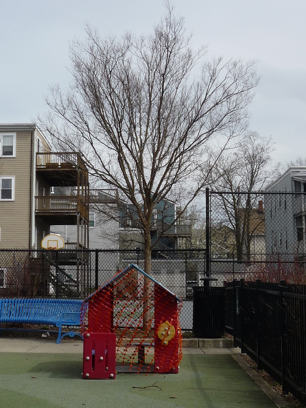 Small playground in a neighboorhood.