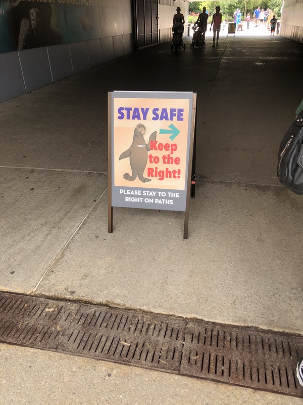 Photo of a social distancing sign directing foot traffic to Keep to the Right.