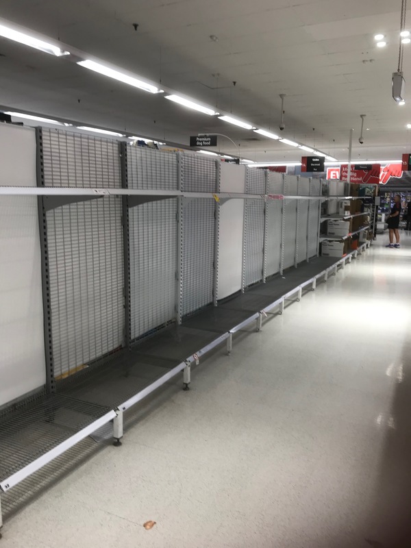 An empty aisle in a supermarket. 