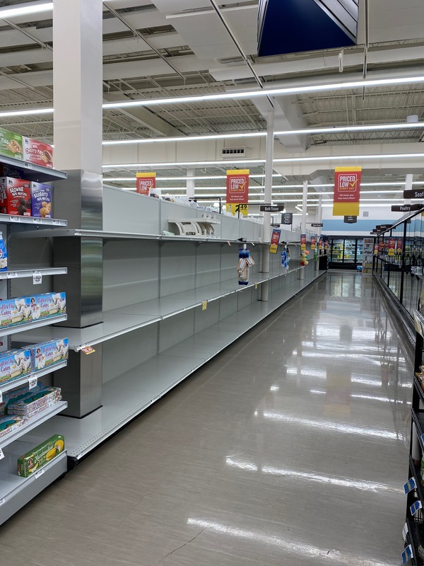 Empty shelves at a grocery store. 