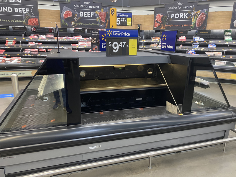 An empty shelf at a store. 