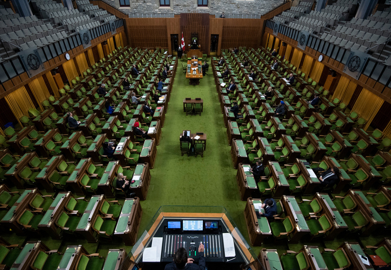 This is a picture of the mostly empty floor of the Canadian Parliament while the House of Commons is in session. 