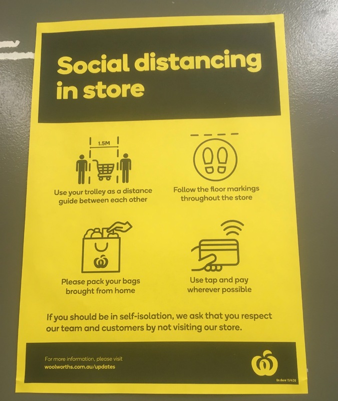 Yellow paper with text,  "Social distancing in store." There are four pictures about how to social distance. First one has two people and a trolley measuring 1.5 meters distance between them. Second shows floor markings that will be throughout the store. Third asks to pack the bags you brought from home. Fourth asks you tap to pay when possible. Text at bottom says, "If you should be in self-isolation, we ask that you respect our team and customers by not visiting our store."