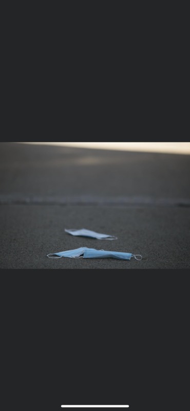 Photo of face masks on the ground.