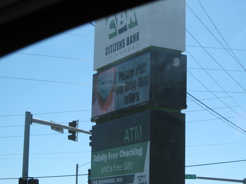 Photo of a sign outside of a business. 