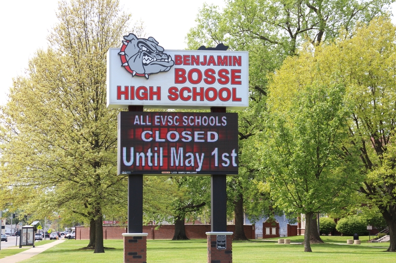 A school sign reading "All EVSC Schools Closed Until May 1st".