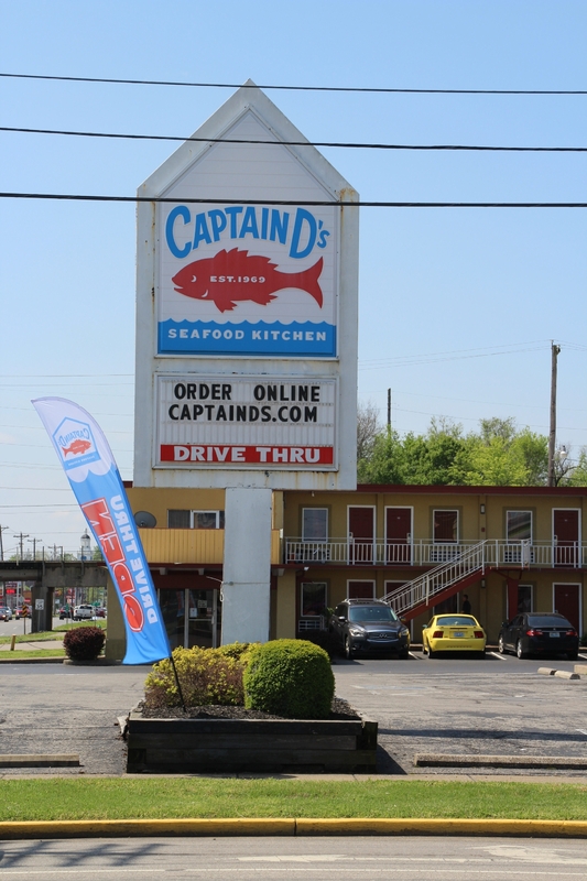 A Captain D's sign reading "order online captainds.com"