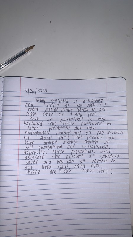 A notebook that has a journal entry talking about e-learning and going outside to feel normal in quarantine. The journal entry also talks about the schools being closed until the end of April and how this is their "new lives".