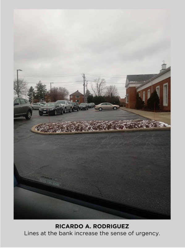 Photo of a long line at the bank. 