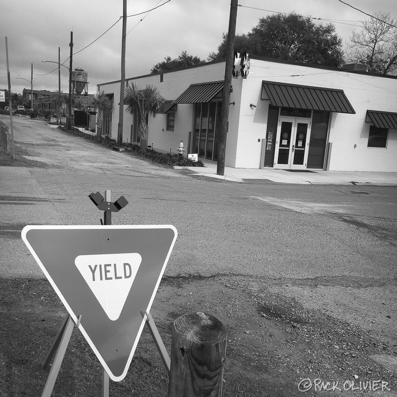 On the corner of an empty street. 