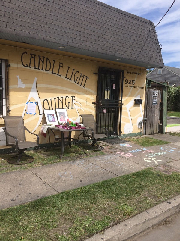 An altar in front of candlelight lounge. 