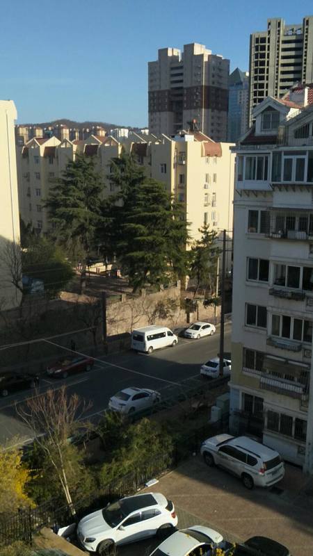 A street with apartment buildings. 