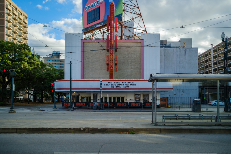 A theatre that says on the sign: "We love you NOLA stay safe & wash your hands be back soon!"