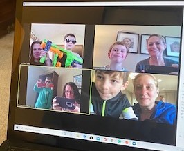 A zoom meeting between multiple people. 