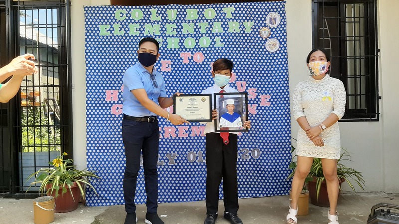 A child graduating elementary school.