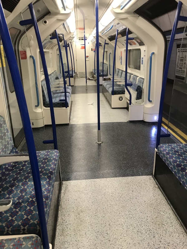 Inside of an empty subway. 