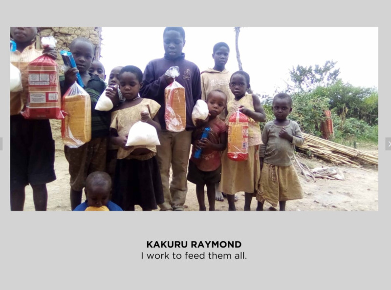 A photo of eleven children holding bread.