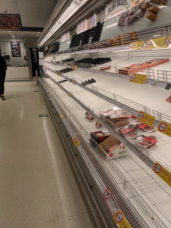 Empty shelves in a grocery store. 