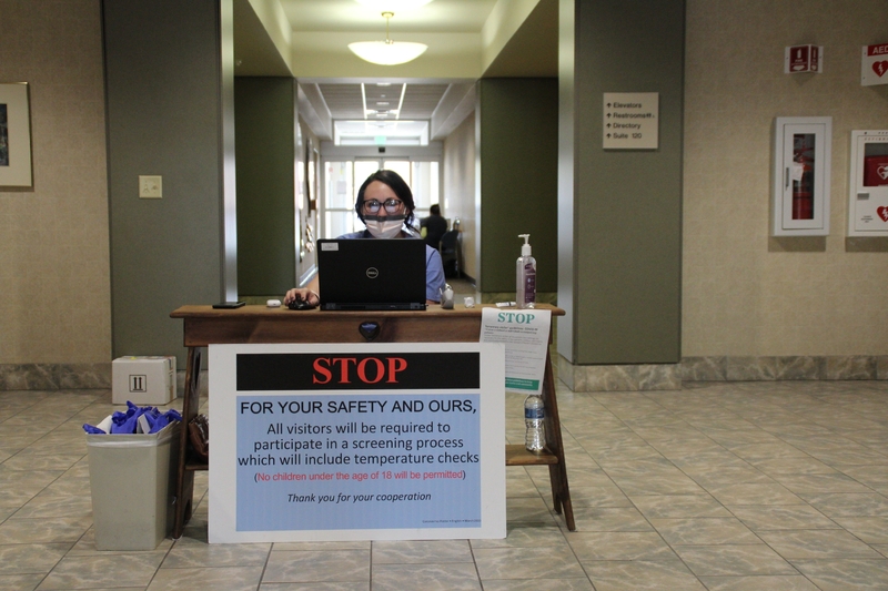 Photo of a COVID-19 screening check point.