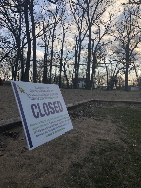 A sign in a children's playground. 