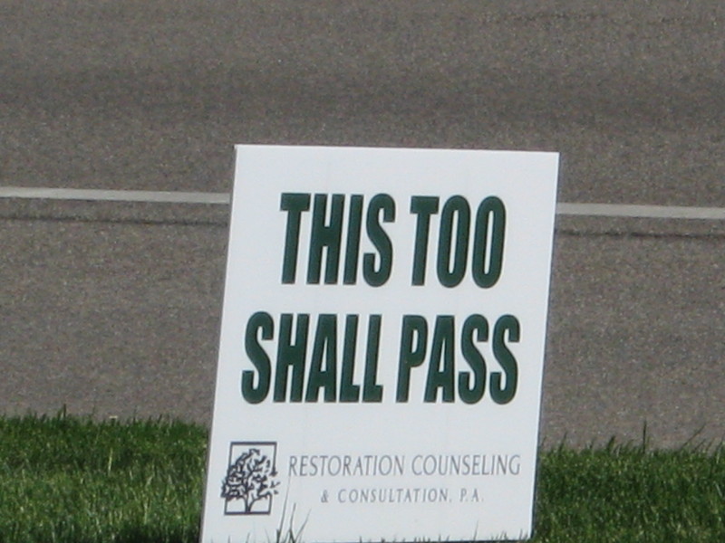 Image of a sign that says this too shall pass.