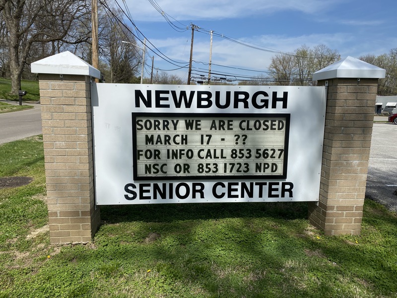 A sign outside a senior center reading "Sorry We Are Closed March 17 Through ?? For More Info Call 853-5627 NSC or 853 1723 NPD".