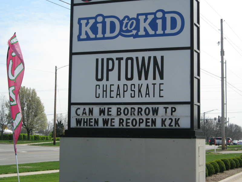 Image of a business billboard which reads can we borrow TP when we reopen?