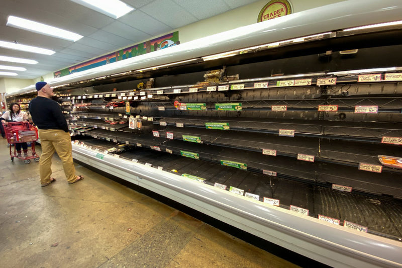 Empty shelves at a grocery store. 