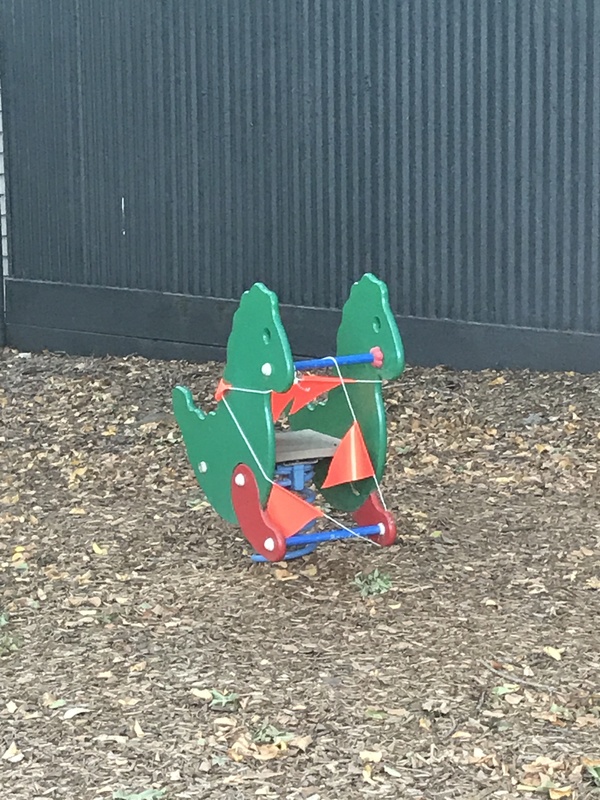 Play equipment wrapped up in rope. 