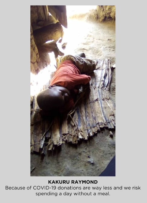 A child sleeping on a mat.