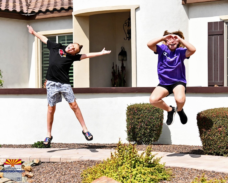 Two people doing funny poses. 