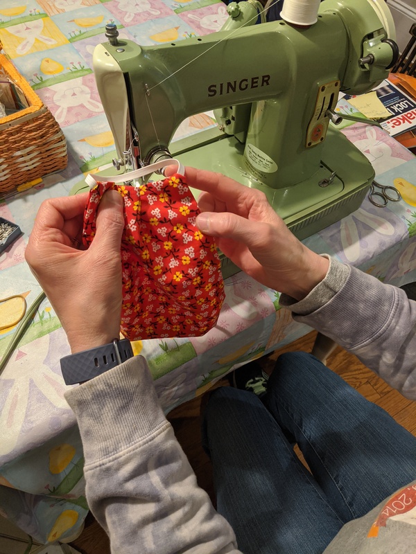 Sewing facemasks.