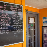 Closed sign on the front door of Taqueria Gerrero in New Orleans, LA.