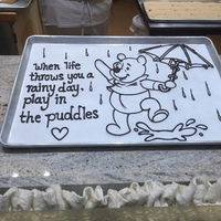 A tray that says "When life throws you a rainy day, play in the puddles".