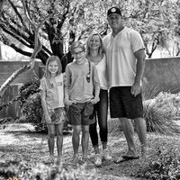 Family posing for a picture. 