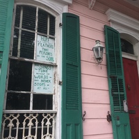 a green sign about hope on a window