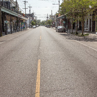 Magazine St. in New Orleans is empty with no tourists, or patrons. 