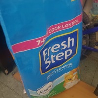 This is a picture of a blue bag of Fresh Step cat litter. 