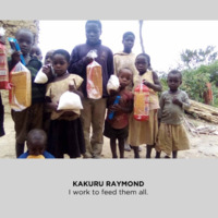 A photo of eleven children holding bread.