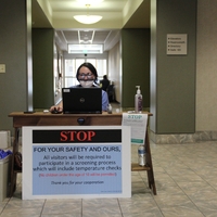 Photo of a COVID-19 screening check point.