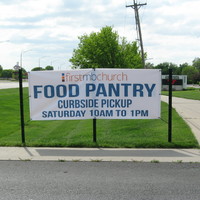 Image of a sign for a food pantry curbside pickup.