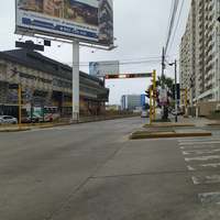 A street that has barely any cars on it. 