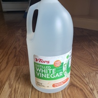 A jug of distilled white vinegar. 