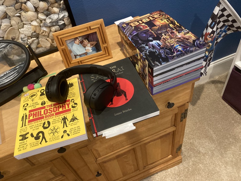 Books and headphones on a table. 