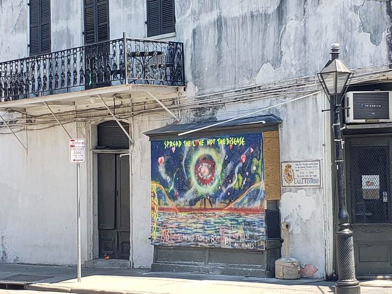 street art stating spread love not the disease